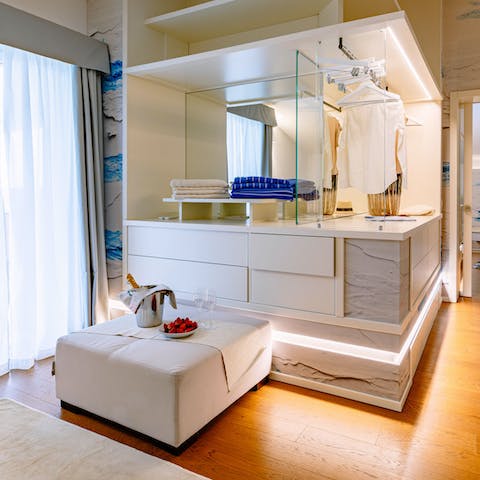 Hang up those linen suits and party frocks in the impressive walk-in wardrobe