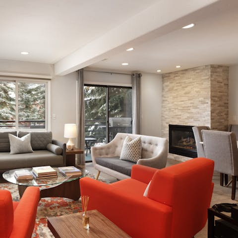 Cosy up by the fire in the open-plan living space