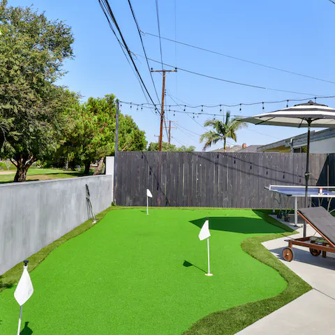 Play a few holes on your mini putting green