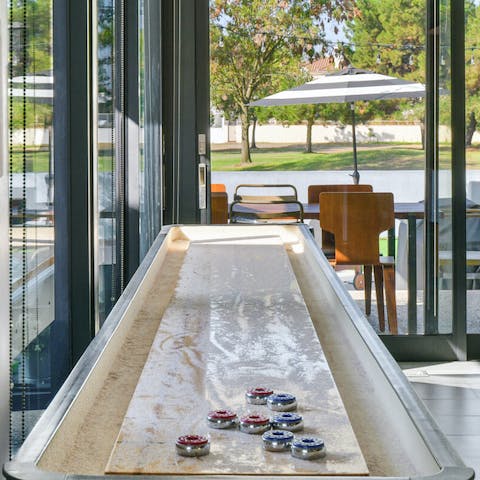 Take time out to play a game or two of shuffleboard
