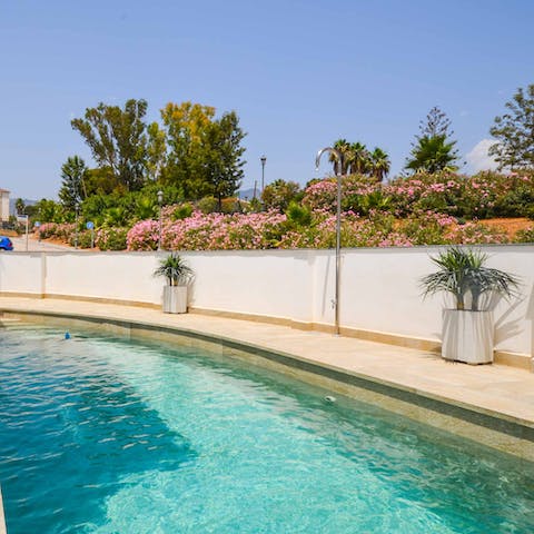 Cool off in the quirkily-shaped swimming pool