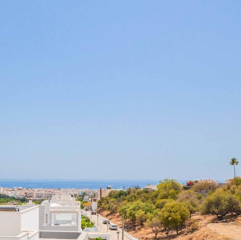 Admire the sea view with a drink on one of the balconies