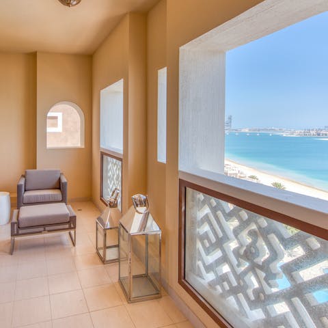 Enjoy a cool drink on the private covered terrace, with stunning views before you