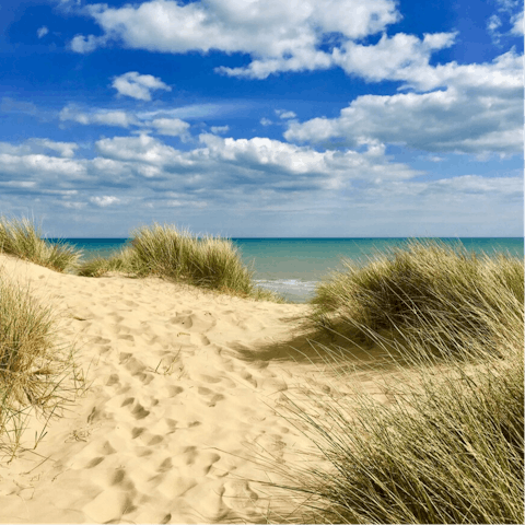 Stay within an eleven-minute walk of Camber Sands beach