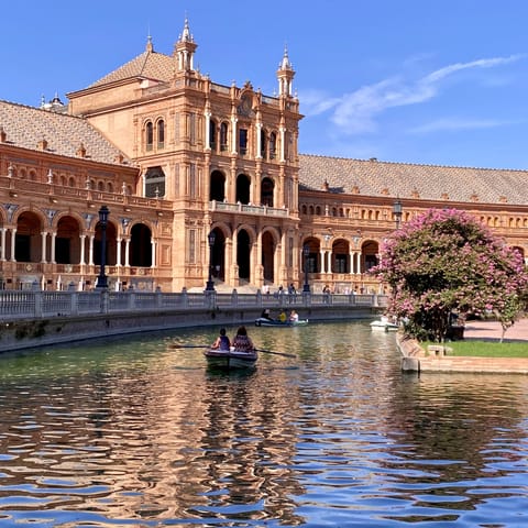 Visit the beautiful Plaza de España, a short bus ride away