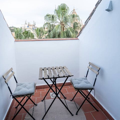 Enjoy a glass of Spanish wine out on your private balconies 