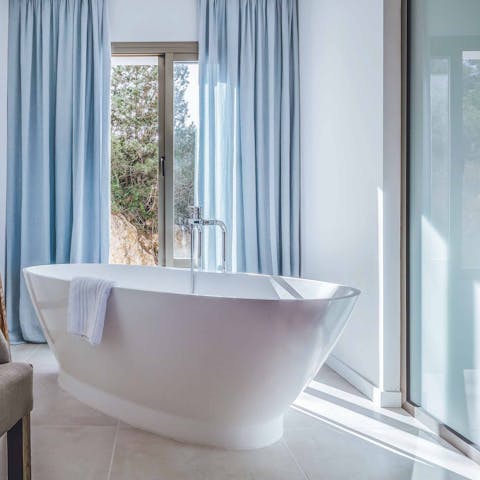 Treat yourself to a long, luxurious soak in the freestanding tub