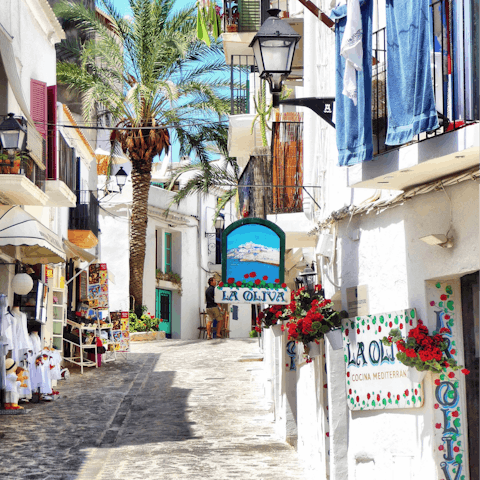 Stroll the cobbled lanes of Ibiza Town, only a short drive away