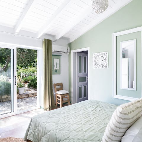 Wake up to pretty garden views from the elegant bedrooms