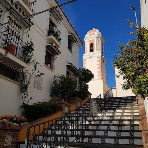 Explore palm-lined promenade and secluded coves of Estepona