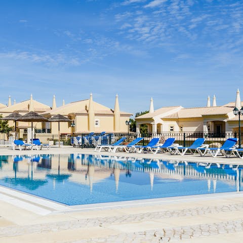 Take a refreshing dip in the communal pool or relax and catch some rays 