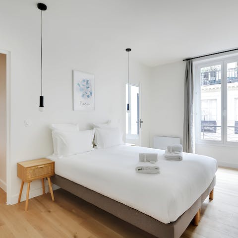 Enjoy a blissful night's sleep in the minimalist bedroom