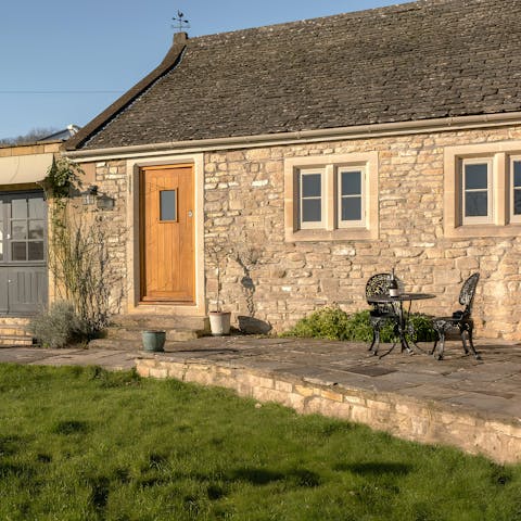 Soak up the sun on the patio and admire the countryside views