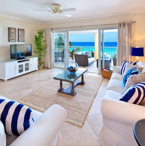 Admire sensational sea views from the comfort of your light-filled living room