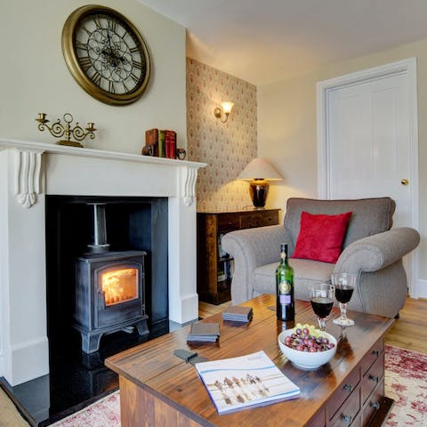Find a cosy spot by the fire to curl up with a good book