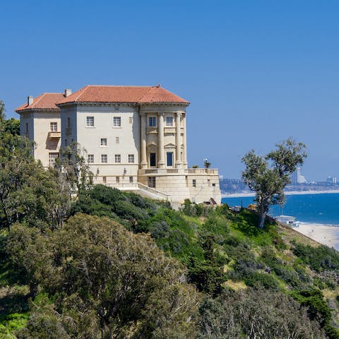 Admire the view of the Getty Villa and the Pacific Ocean from the balcony