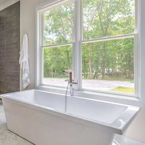 Unwind with a soak in the freestanding tub