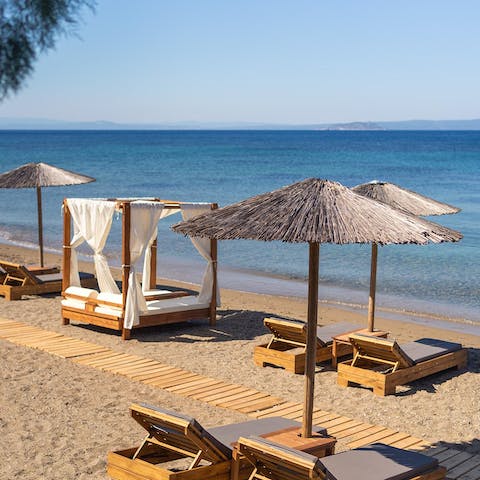Head down to the resort's private beach for a day of rest and relaxation