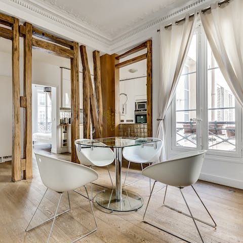 Tuck into your coffee and croissants at the sleek dining area