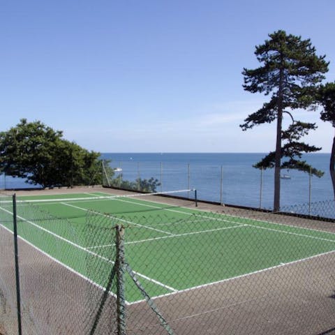 Practice your serve on the communal tennis court