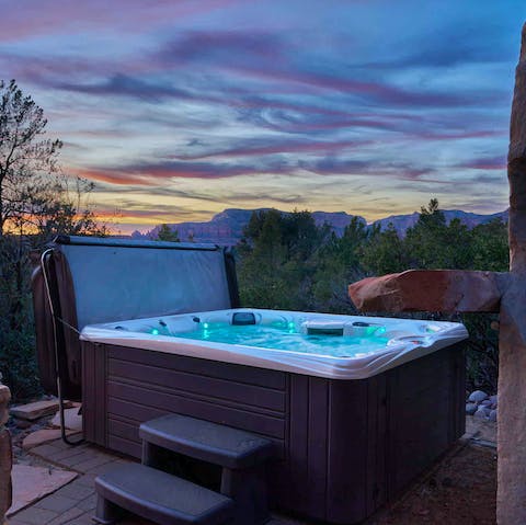 Sink into the hot bubbles of the Jacuzzi under the stars