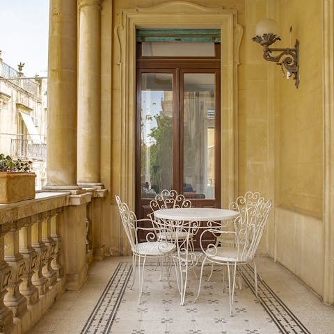 Sip a glass of Marsala on the balustraded terrace 
