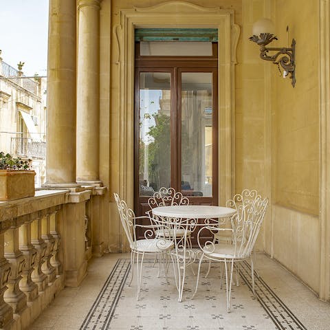 Sip a glass of Marsala on the balustraded terrace