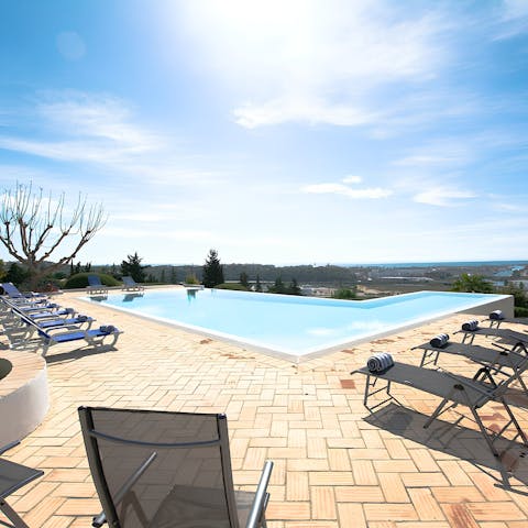 Drink in the sunshine and views of Lagos from the private infinity pool