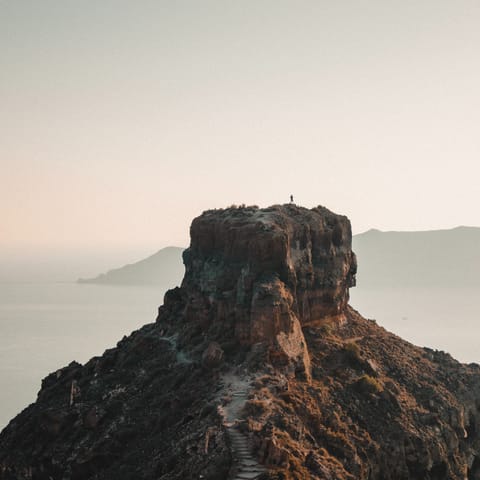 Visit the enchanting landscape of Skaros Rock, a three-minute drive away