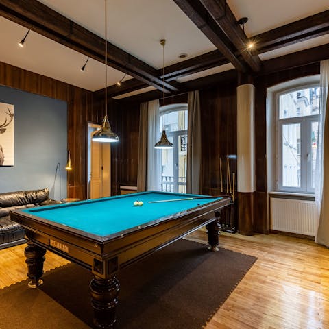 Unwind by the pool table as you challenge your loved ones to a game
