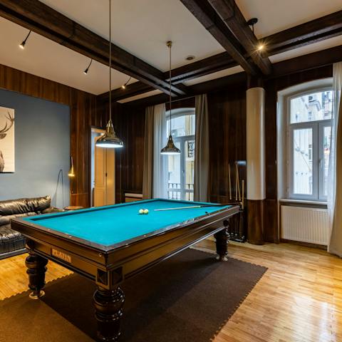 Unwind by the pool table as you challenge your loved ones to a game