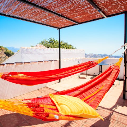 Laze about in the hammocks