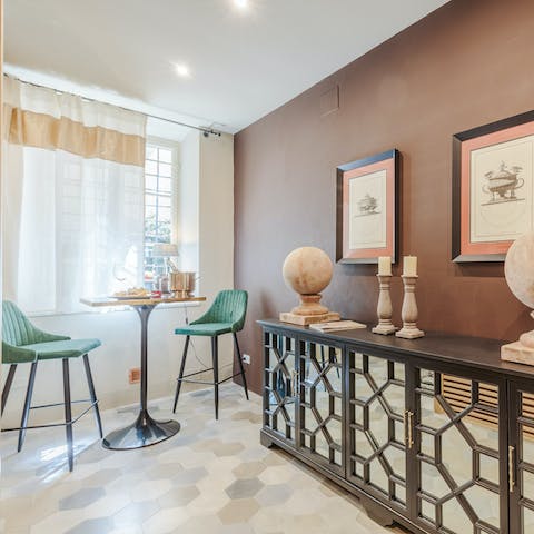 Enjoy a drink at the chic bar before getting ready to go out