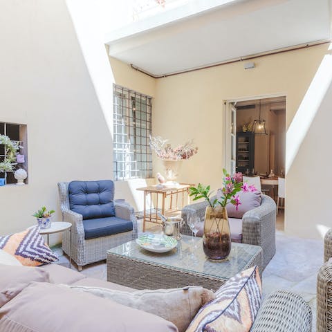 Celebrate with a bottle of bubbly in the outdoor lounge