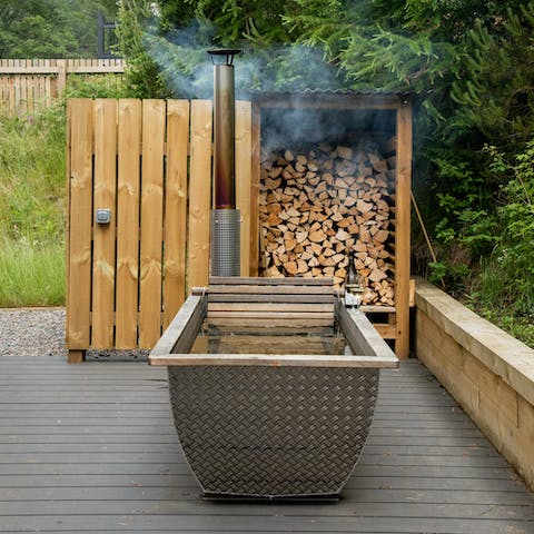 Sink into the wood-fired hot tub after a day of exploring
