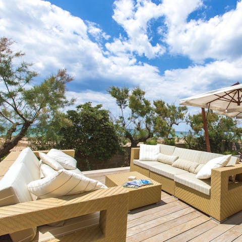 Soak up the sun and sea views from your pretty terrace