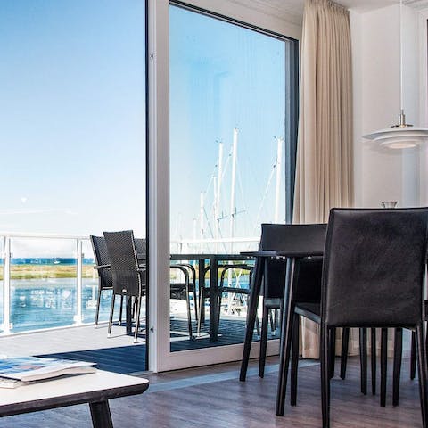 Dine on the deck and enjoy the view of Wendtorf Marina