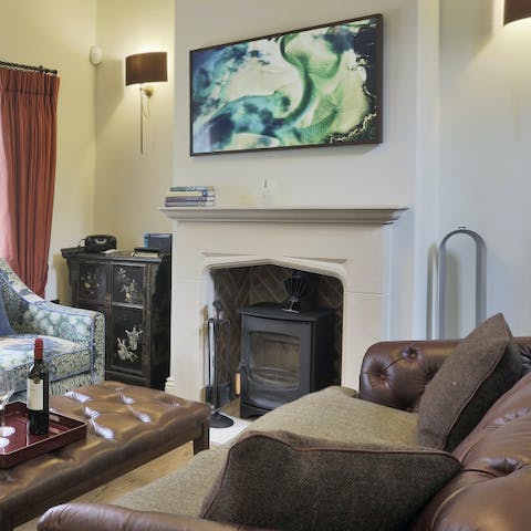 Gather by the wood burner on chilly days