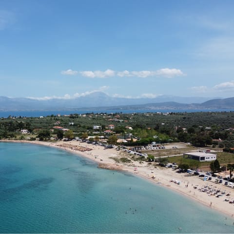 Drive down to Alykes beach with its soft white sands and crystal waters