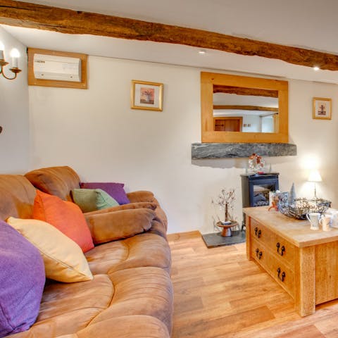 Stoke up the wood-burner and enjoy a cosy evening in under the exposed beams 