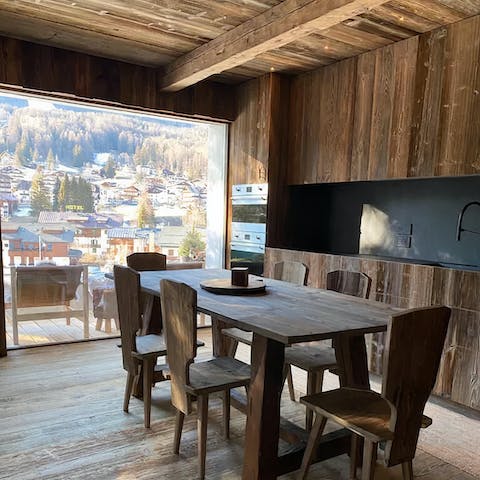 Admire the scenic views of Cortina D'Ampezzo out through the large window
