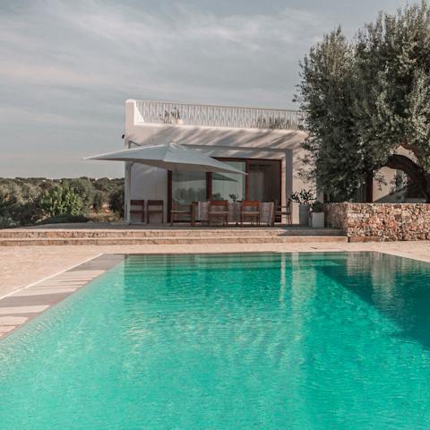 Swim in the private infinity pool to cool down from the heat of the Italian sun