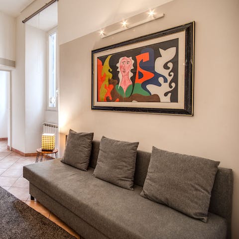 Relax in the living room with its modern art prints