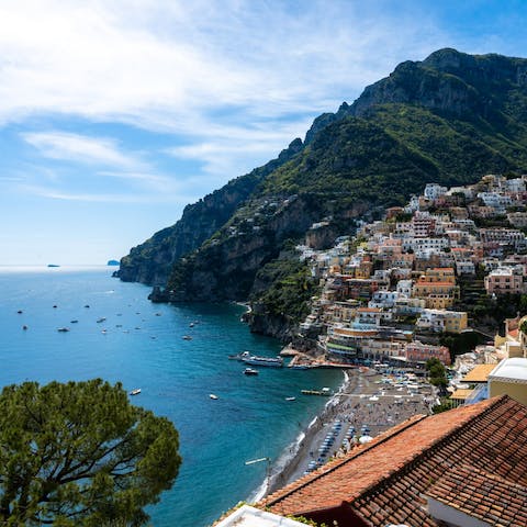Explore the sandy beaches and colourful buildings of Positano