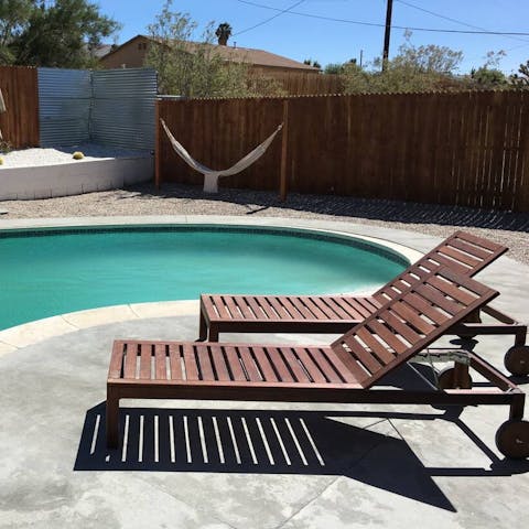 Work on your tan beside the pool