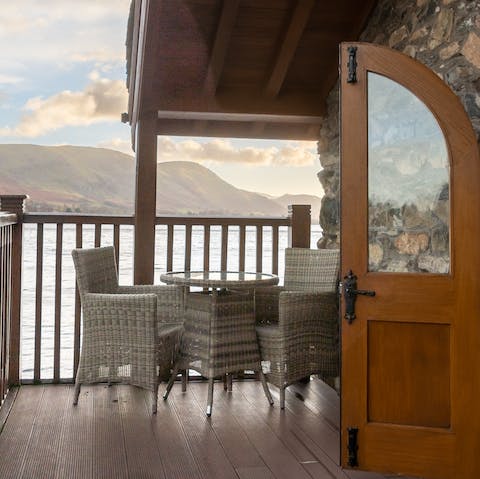 Enjoy chilled champagne on your private terrace above the lake