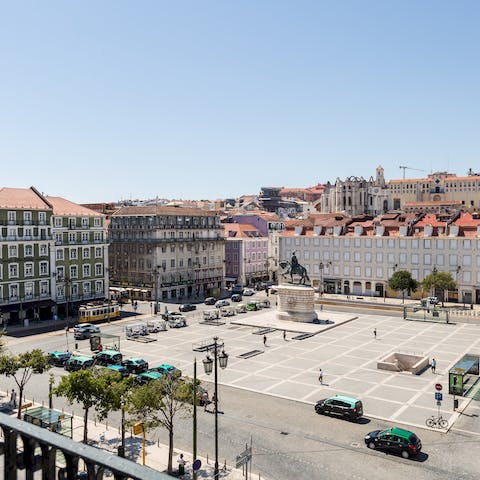 Look out to impressive views of the historic Praça da Figueira from your balcony