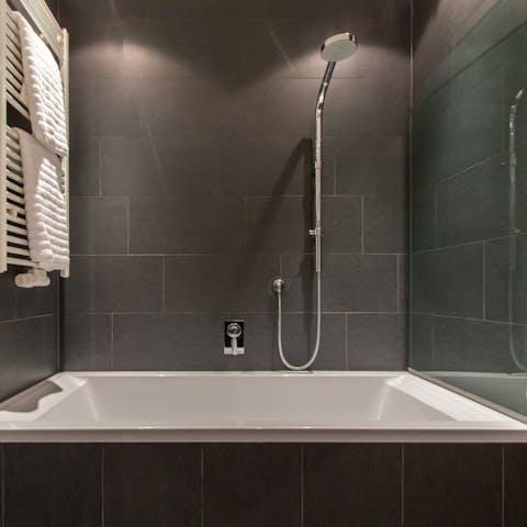 Treat yourself to a long and leisurely soak in one of the sleek bathtubs