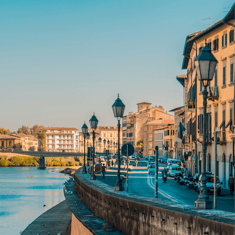 Hop in a taxi for thirty minutes to spend the day in the iconic city of Pisa