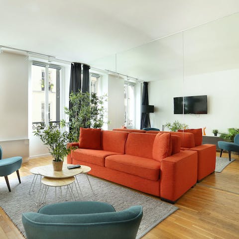 Plan your day in Paris from the large red sofa